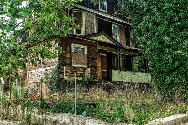 Vacant house with boarded windows