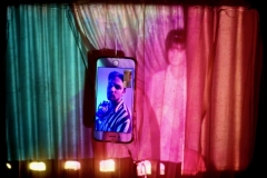 Portrait depicting Samuel on iPhone