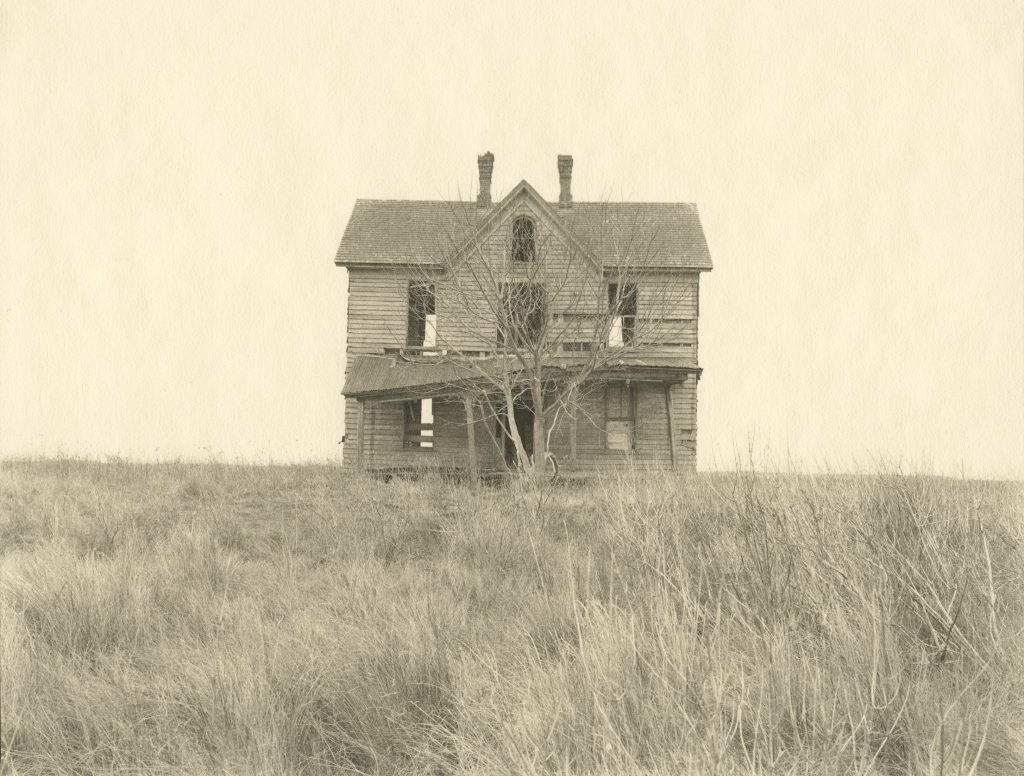 Abandoned house in the field